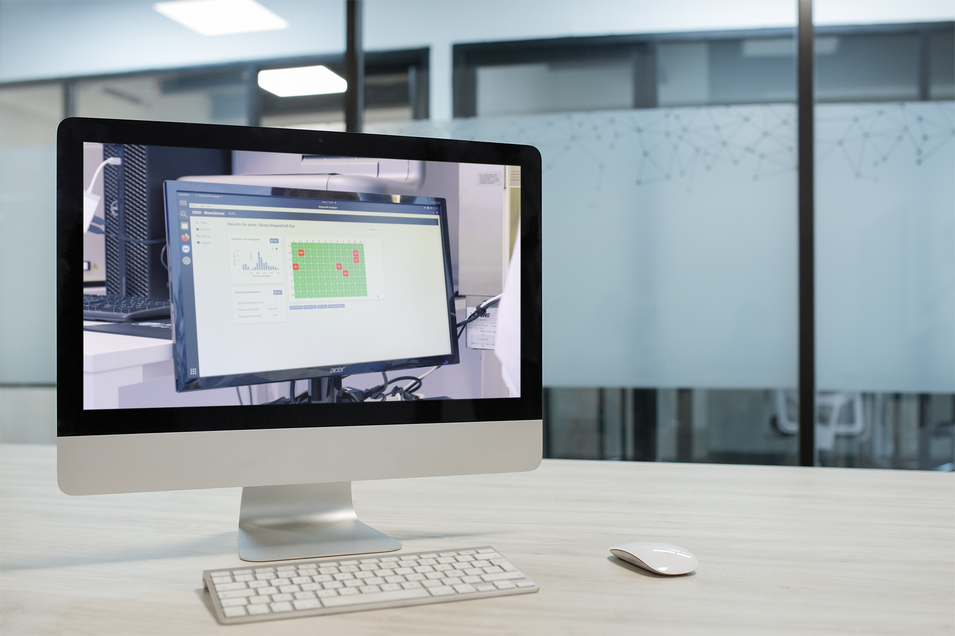 imac-mockup-standing-with-wireless-keyboard-and-mouse-in-a-corporate-office-a20970 (1)